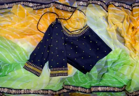 Tie and die green and yellow saree with aari work blouse